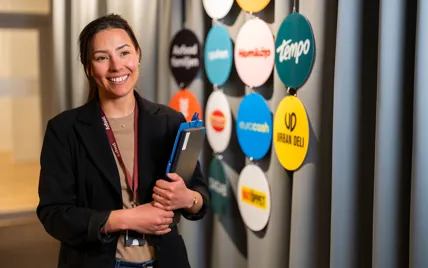 Female employee walking in corridor